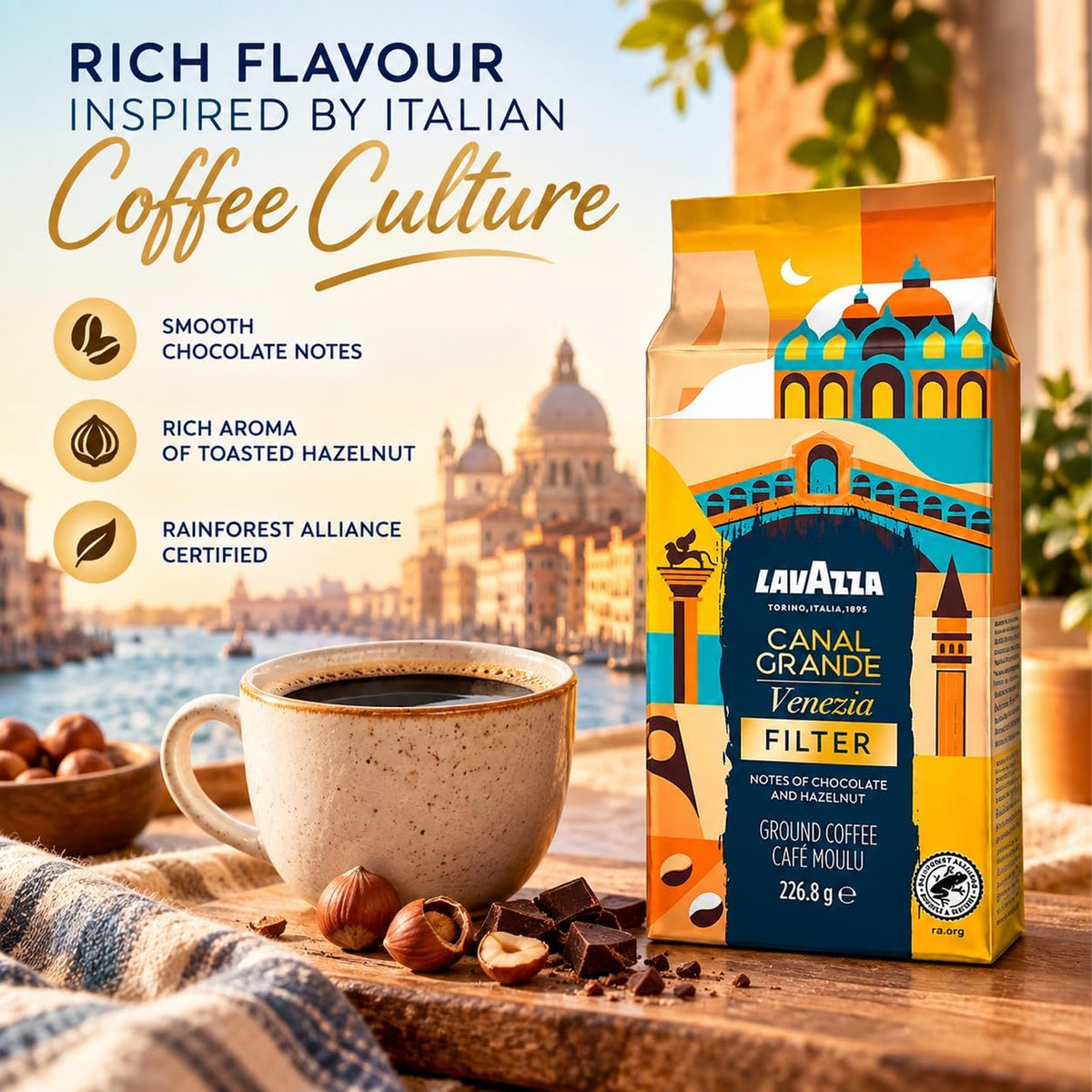 LavaZia Canal Grande Venezia filter coffee in a colorful illustrated package, shown beside a cup of black coffee, hazelnuts, and chocolate on a wooden surface with a scenic city background and marketing text on the left.