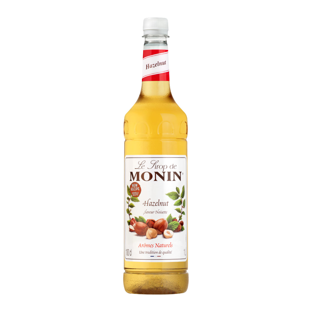 Bottle of Monin Hazelnut syrup on a white background