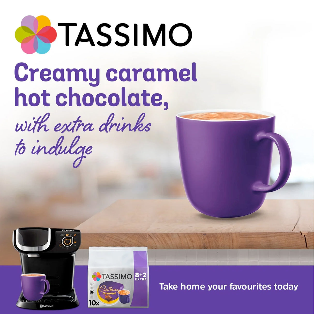 Tassimo coffee machine and purple mug with creamy caramel hot chocolate on a blurred background