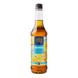 Bottle of Tate & Lyle gingerbread syrup on a white background