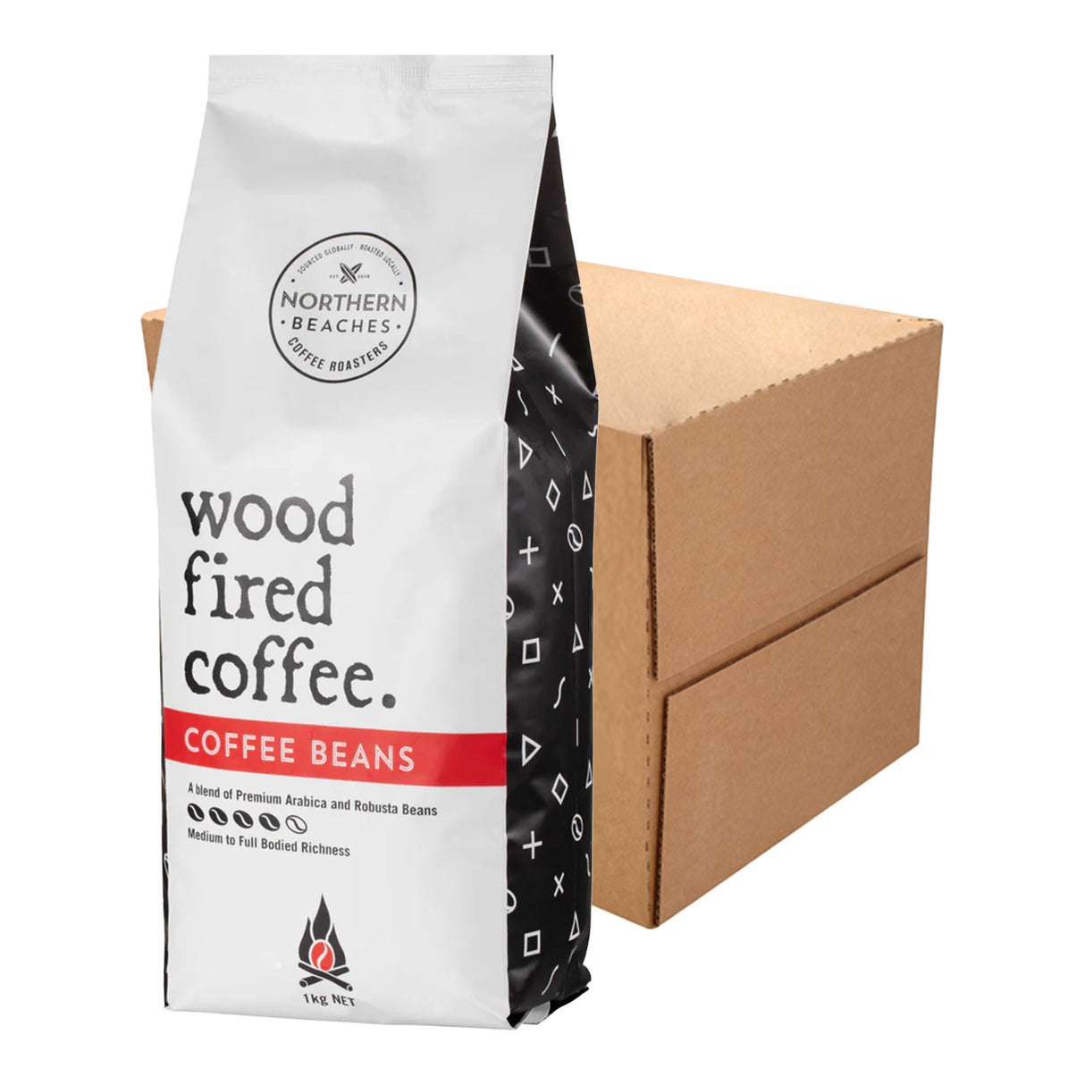A bag of Northern Beaches Wood Fired Coffee Beans stands in front of a plain brown cardboard box on a white studio background.