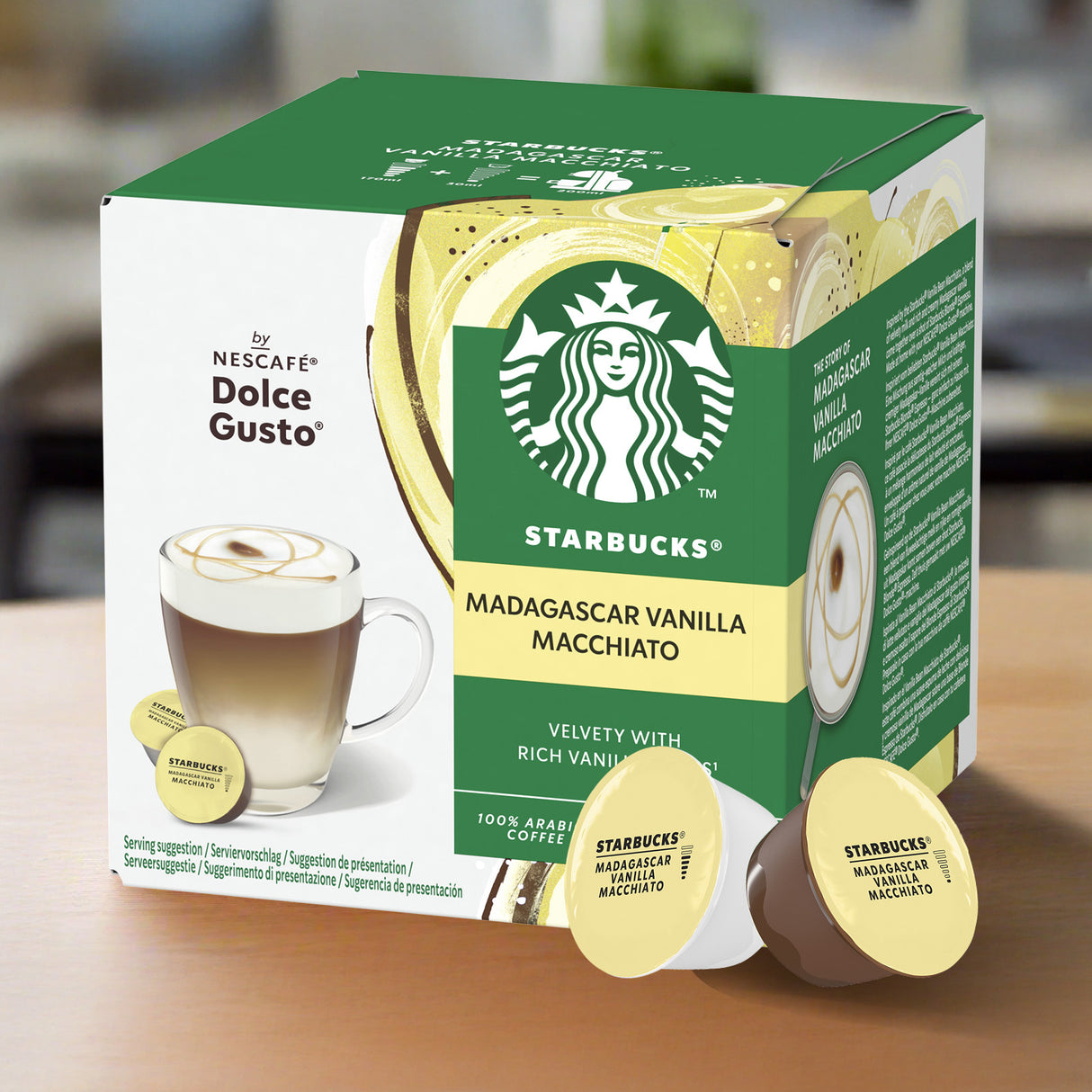 Starbucks Madagascar Vanilla Macchiato coffee pod box on a wooden surface