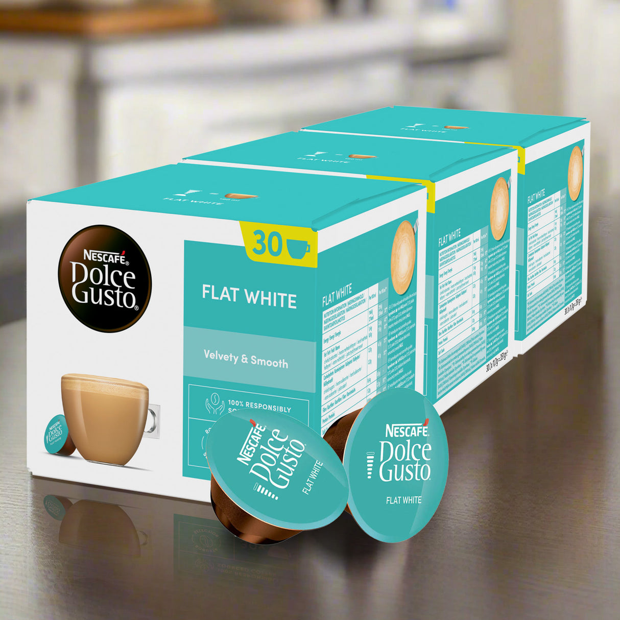 Box of Nestèlé Dolce Gusto Flat White coffee capsules on a kitchen counter.