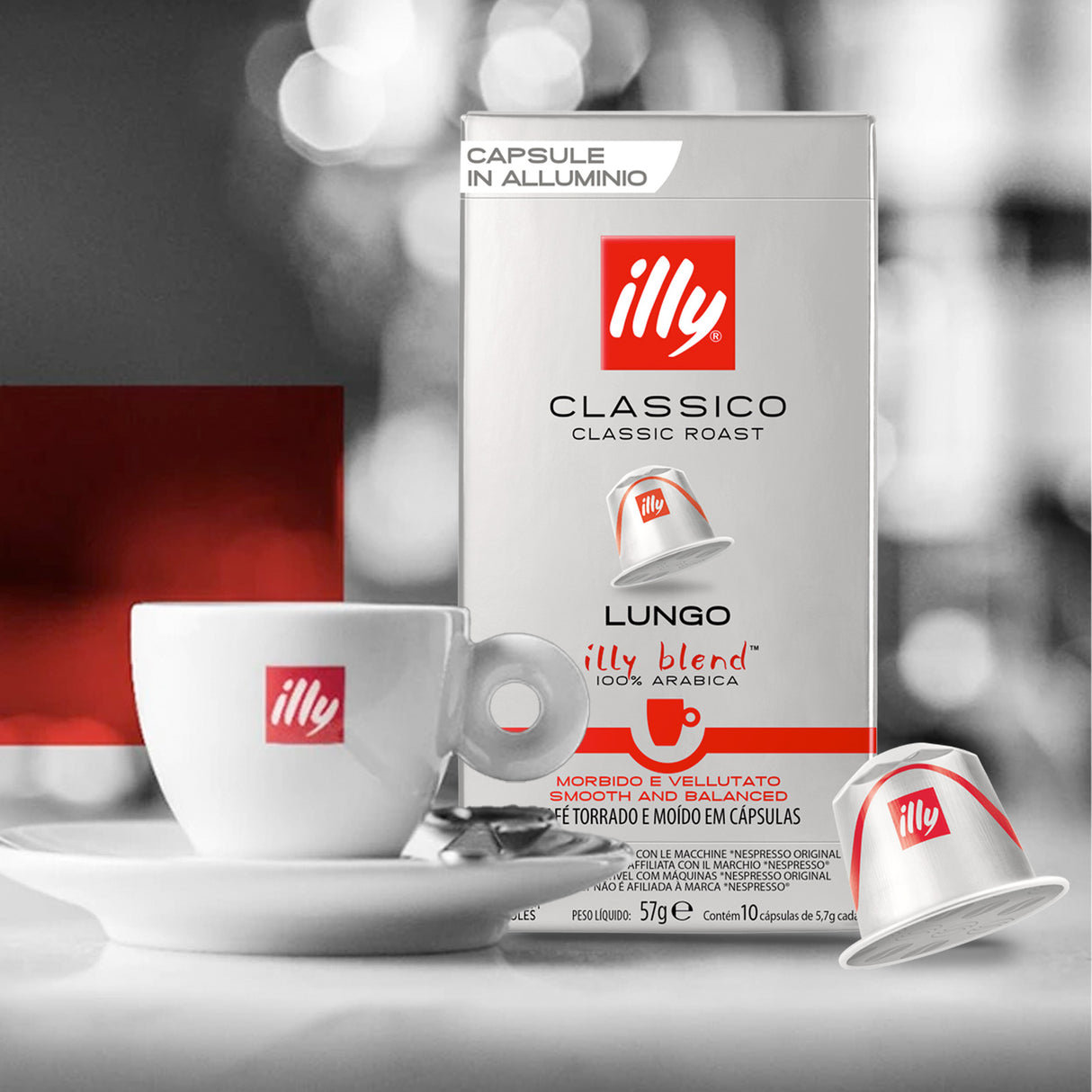 illy coffee capsule packaging with a cup and saucer in the foreground