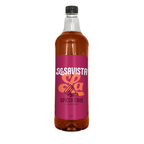 A 1L clear bottle of Savista Spiced Cake Flavour Syrup filled with amber-brown liquid, featuring a bright magenta label with white and orange branding, on a plain white background.