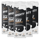 Packaging of Mighty Ultimate Oat Barista drinks on a white background