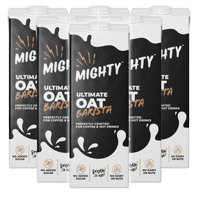 Packaging of Mighty Ultimate Oat Barista drinks on a white background