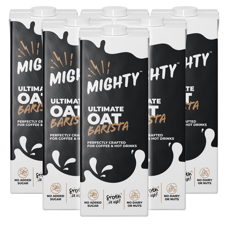 Packaging of Mighty Ultimate Oat Barista drinks on a white background