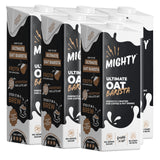 Multiple cartons of Mighty Ultimate Oat Barista on a white background