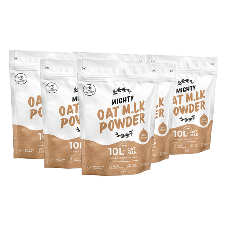 Five stand-up pouches of Mighty Oat Milk Powder arranged in a fan-like product lineup on a plain white background.