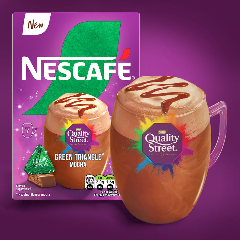 Nescafe Quality Street Green Triangle Mocha packaging with a mug of coffee on a purple background