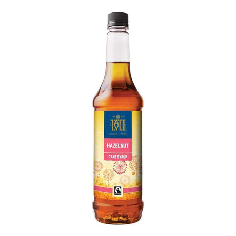 Bottle of Tate & Lyle hazelnut cane syrup on a white background
