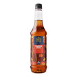Bottle of Tate & Lyle Pumpkin Spice syrup on a white background