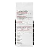 The back of a Wood Fired Coffee bag, showing detailed product information, roast details, tasting notes, and company details in black and red text on a white background.