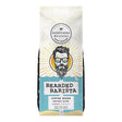 A bag of Northern Beaches Coffee Roasters 'Bearded Barista' coffee beans, featuring a stylized illustration of a bearded man with glasses on the front, set against a plain white background.