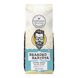 A bag of Northern Beaches Coffee Roasters 'Bearded Barista' coffee beans, featuring a stylized illustration of a bearded man with glasses on the front, set against a plain white background.