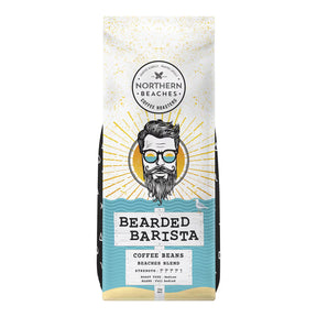 A bag of Northern Beaches Coffee Roasters 'Bearded Barista' coffee beans, featuring a stylized illustration of a bearded man with glasses on the front, set against a plain white background.