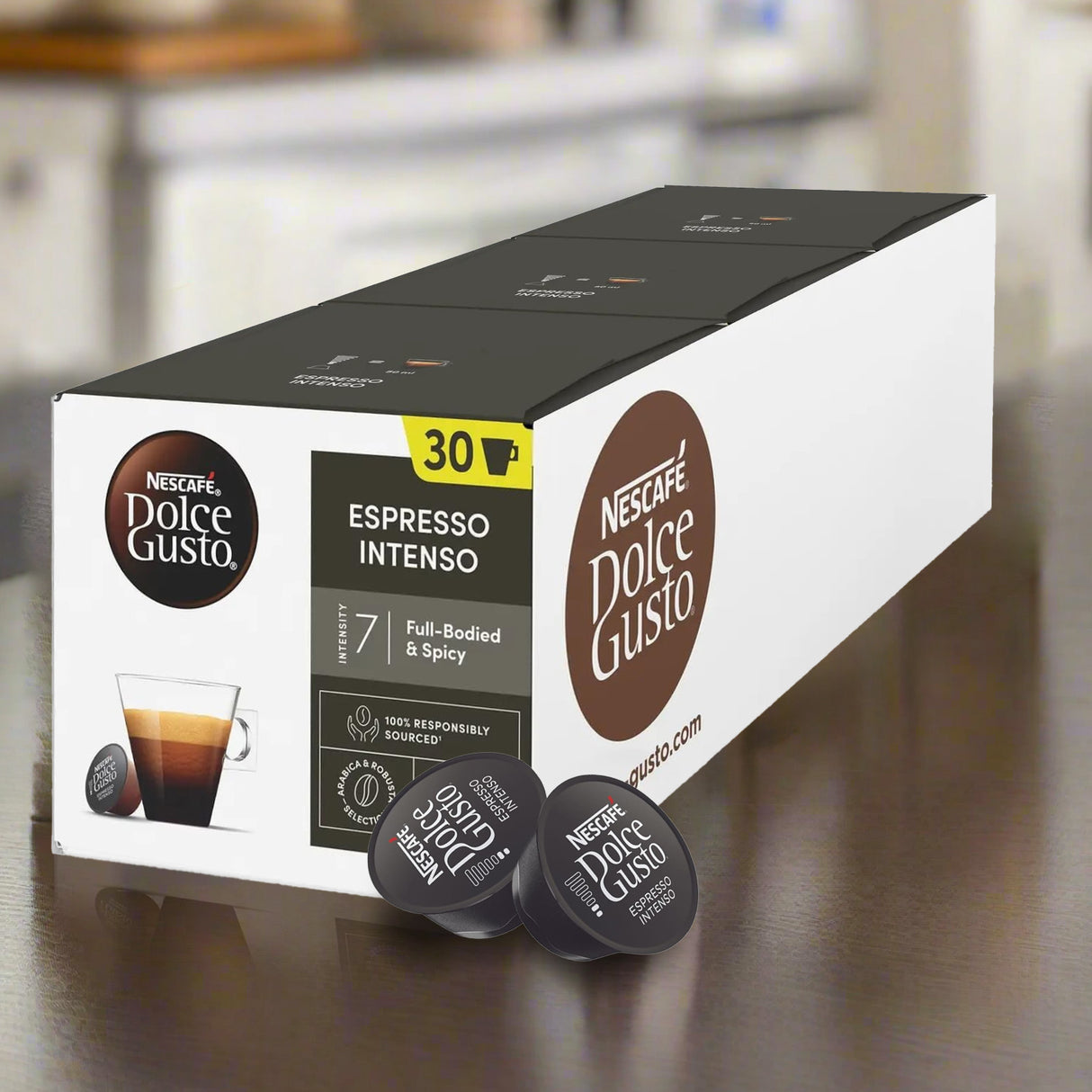 Box of Nescafe Dolce Gusto Espresso Intenso coffee capsules on a kitchen counter.