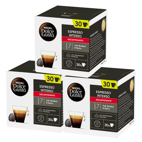 Three boxes of Dolce Gusto Espresso Intenso Decaffeinato coffee capsules on a white background