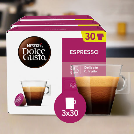 Nescafe Dolce Gusto Espresso coffee capsule packaging on a kitchen counter.