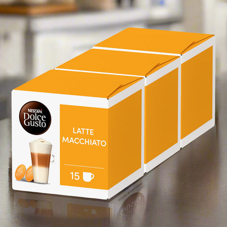 Box of Nescafe Dolce Gusto Latte Macchiato coffee capsules on a reflective surface.