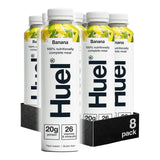 Huel banana-flavored nutritional meal replacement bottles in a 8-pack display.