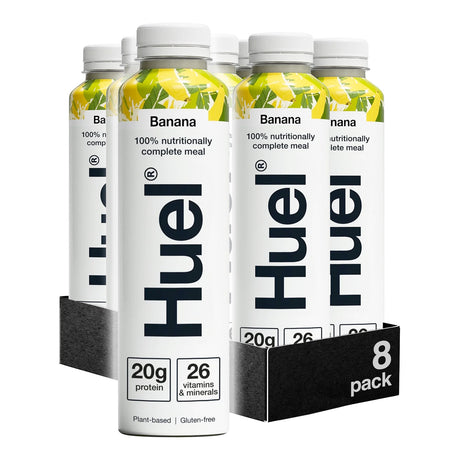 Huel banana-flavored nutritional meal replacement bottles in a 8-pack display.
