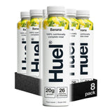 Pack of Huel banana-flavored nutritional meal replacements with visible branding.