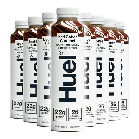Multiple bottles of Hue iced coffee caramel drinks on a white background