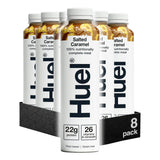 Huel salted caramel meal replacement shake containers on a white background