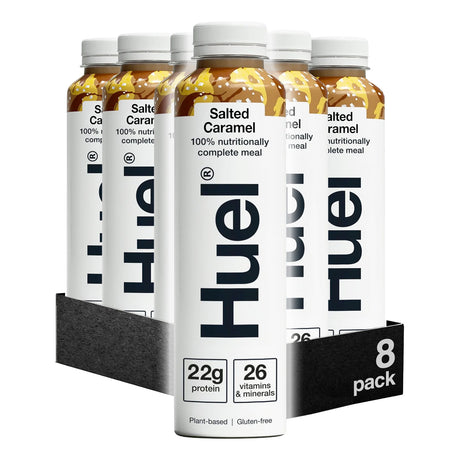 Huel salted caramel meal replacement shake containers on a white background
