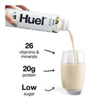 Huel protein shake being poured into a glass with nutritional information displayed.
