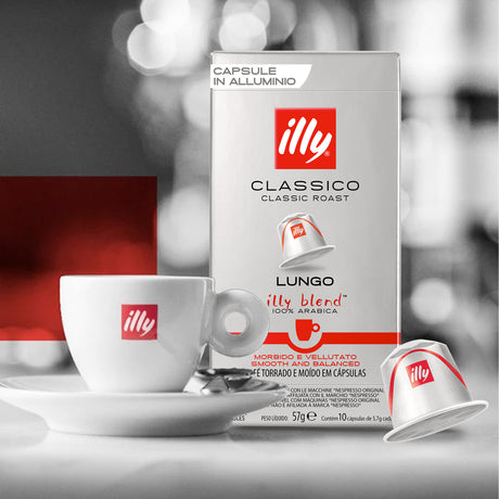 illy coffee capsule packaging with a cup and saucer in the foreground