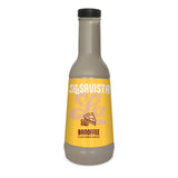A bottle of LaSavista Banoffee Flavoured Sauce on a plain white background. The bottle is filled with a light brown sauce and features a bright yellow label with white and brown text, topped with a black cap.