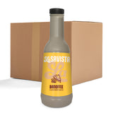 A bottle of LaSavista Banoffee Flavoured Sauce in the foreground with a brown cardboard shipping box behind it on a white background.