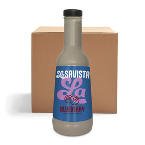 A bottle of LaSavista Blueberry Flavoured Sauce in front of a plain brown cardboard box on a white background.