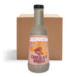 A bottle of La Savista Chocolate Orange Sauce stands in front of a brown cardboard box on a white background. 