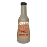 A bottle of LaSavista La Cinnamon Bun Flavoured Sauce on a plain white background. The bottle is a frosted light beige colour with a black cap and a tan label featuring the LaSavista brand logo and cinnamon bun text.