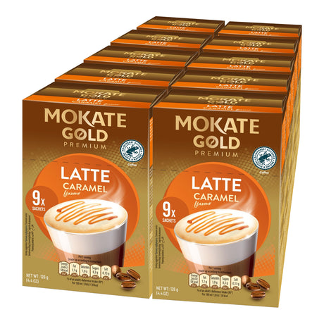 Multiple boxes of Mokate Gold Premium Latte Caramel coffee on a white background