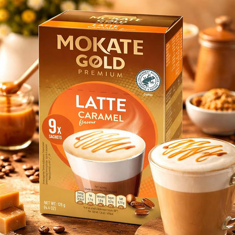 Mokate Gold Premium Latte Caramel coffee packaging with a cup of coffee in the foreground.