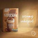 Nescafe Creamy Tiramisu Latte Flavour dessert edition sachet shown on a textured brown background next to promotional text reading 'A creamy and indulgent treat' with a cup icon.