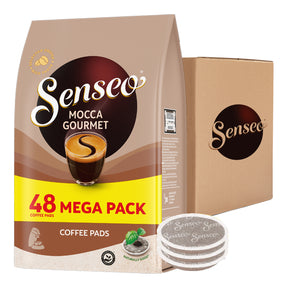 Senseo Mocca Gourmet coffee pads packaging with a box and coffee pads on a white background