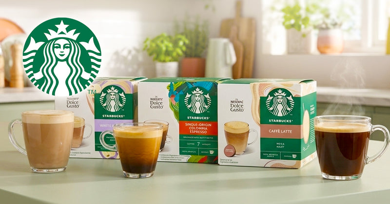 Starbucks coffee packaging and cups on a table with a kitchen background