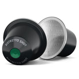 Two coffee capsules, one black and one silver, with 'Starbucks' branding on a white background.