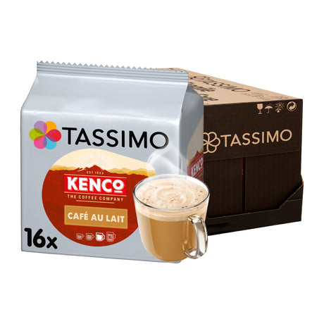 A package of Tassimo Kenco Café Au Lait coffee pods shown in front of its brown cardboard shipping box, with a glass mug of prepared coffee au lait in front of the package on a white background.