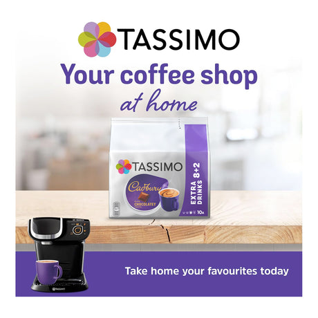 Tassimo coffee machine and Tassimo coffee pods on a table with a blurred background