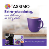 Tassimo coffee machine and cups with a purple mug on a white background