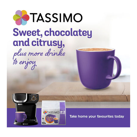 Tassimo coffee machine, pod pack, and purple mug with text on a white background